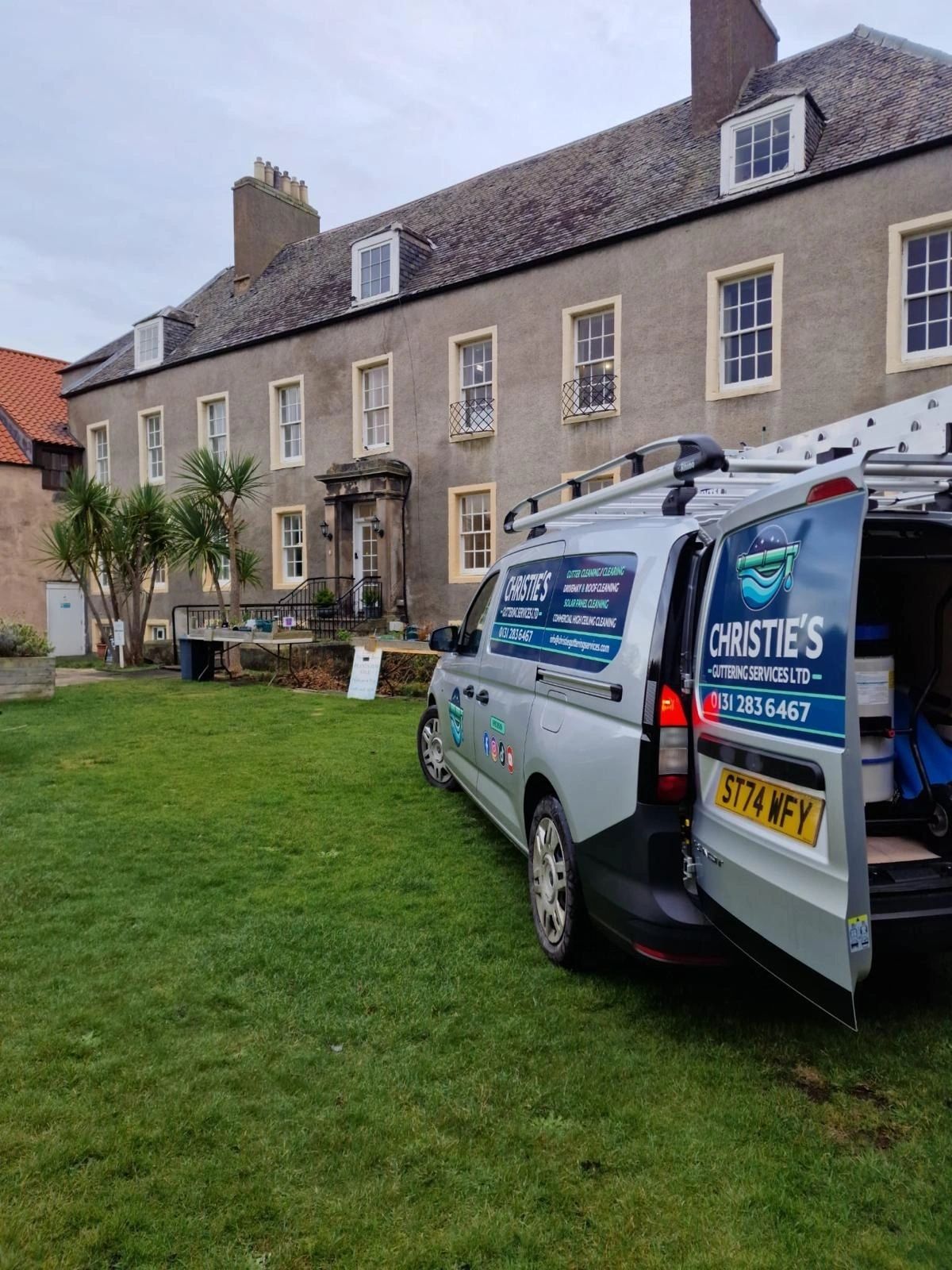 The Christie's Exterior Cleaning van on site at a customer's property